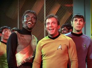  Kirk laughs with McCoy and Kang, and the alien eventually departs.
