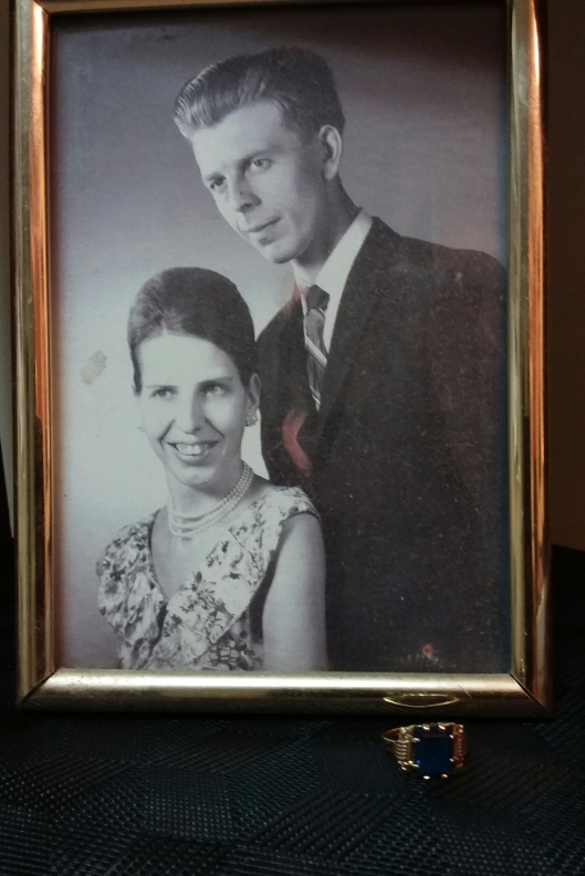 My parents in 1960 and the ring with the blue stone