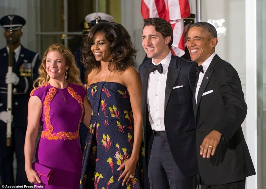 President Barack Obama and first lady Michelle Obama greet Canadian Prime Minister Justin Trudeau and Sophie Grégoire Trudeau at the North Portico of the White House in Washington, Thursday, March 10, 2016, for a state dinner. (AP Photo/J. Scott Applewhite)